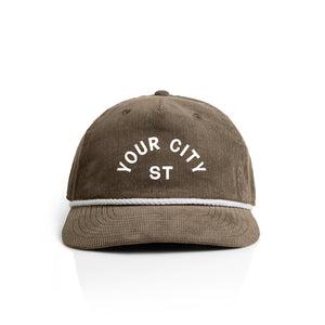 Customizable brown corduroy cap with 'YOUR CITY STATE' text on a white background