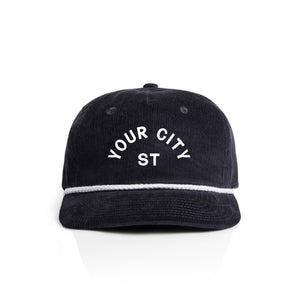 Customizable navy corduroy cap with 'YOUR CITY STATE' text on a white background
