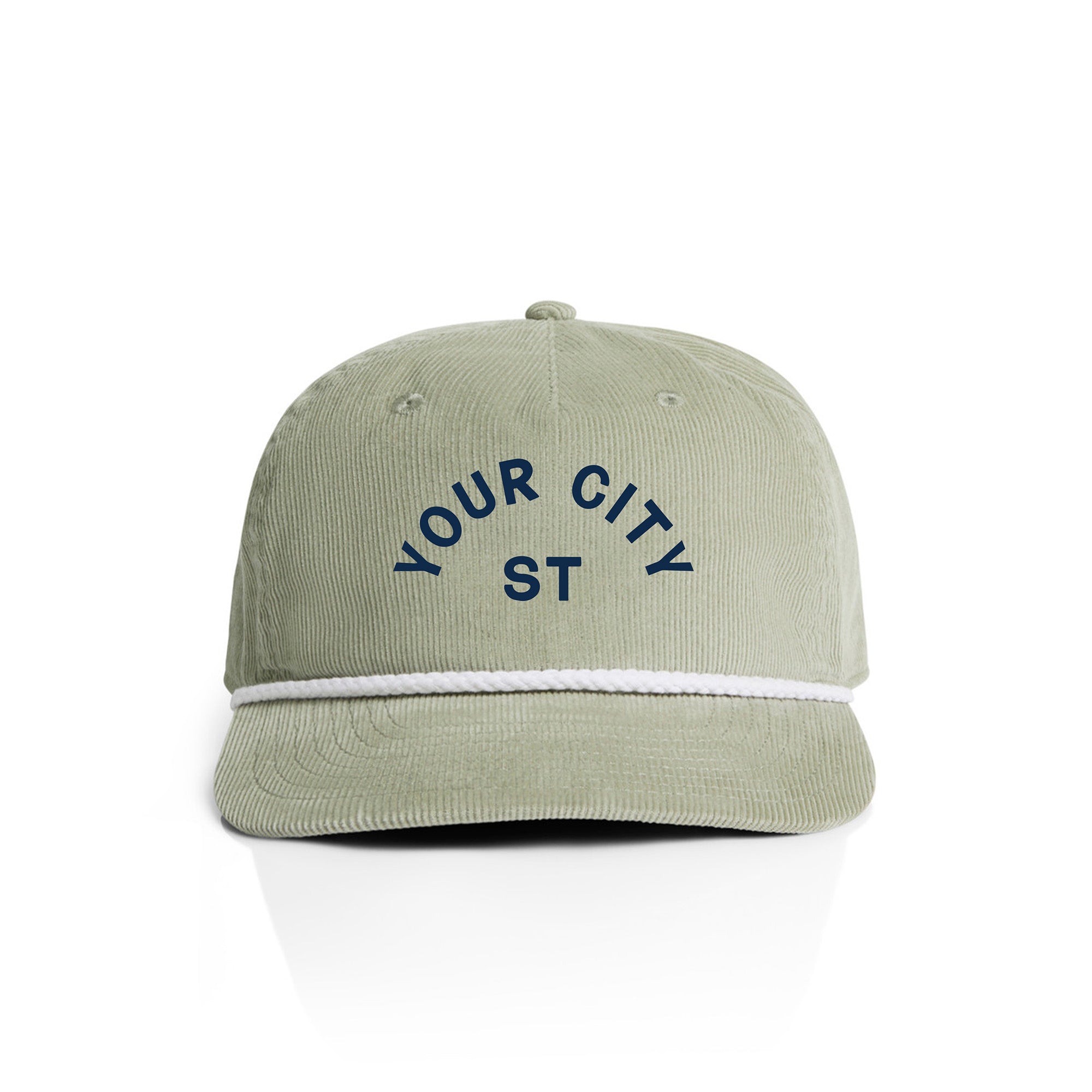Customizable green corduroy cap with 'YOUR CITY STATE' text on a white background