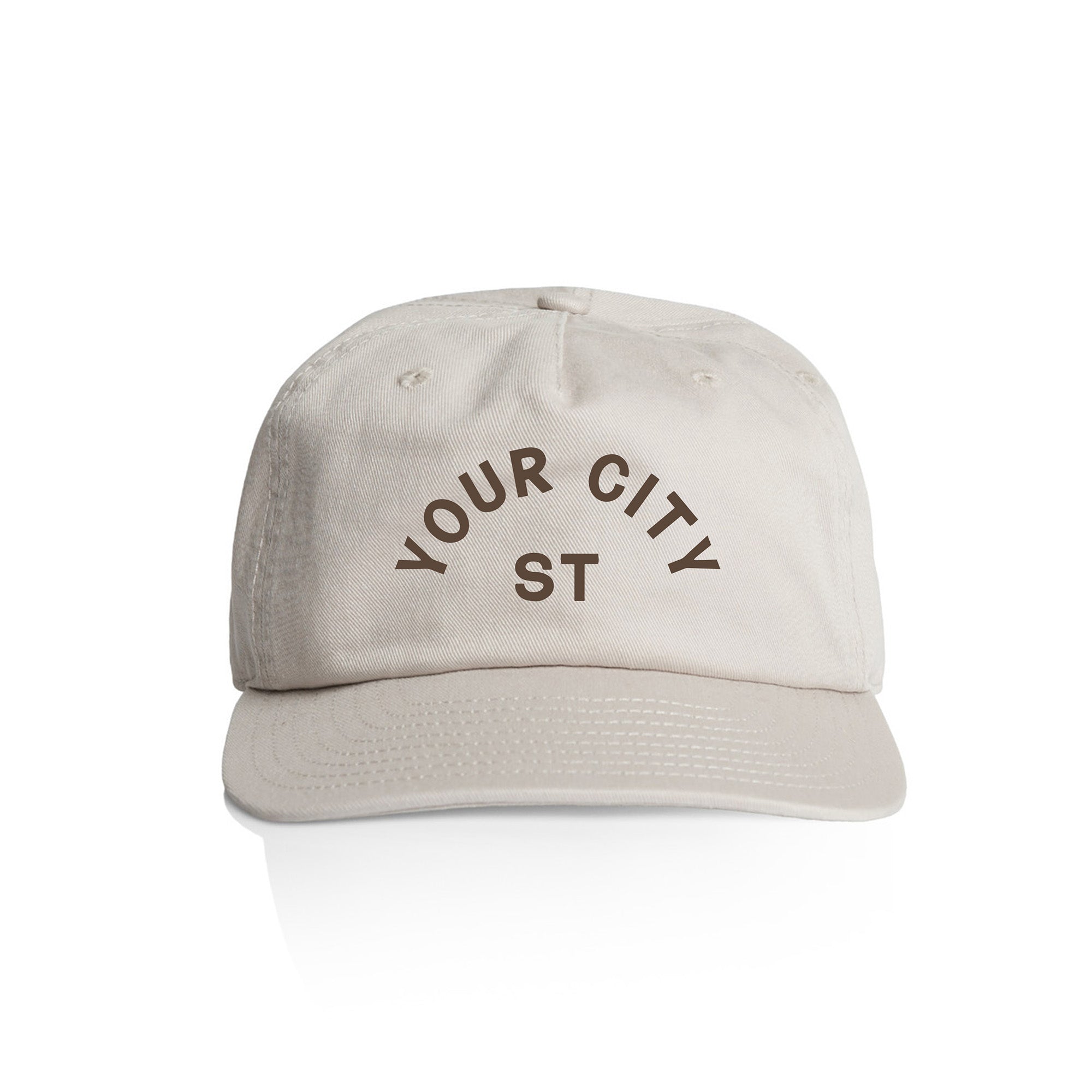 Customizable off white cap with 'YOUR CITY STATE' dark brown text on a white background