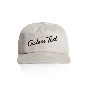 Customizable off white cap with 'Custom Text' in black on a white background
