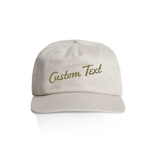 Customizable off white cap with 'Custom Text' in olive green on a white background