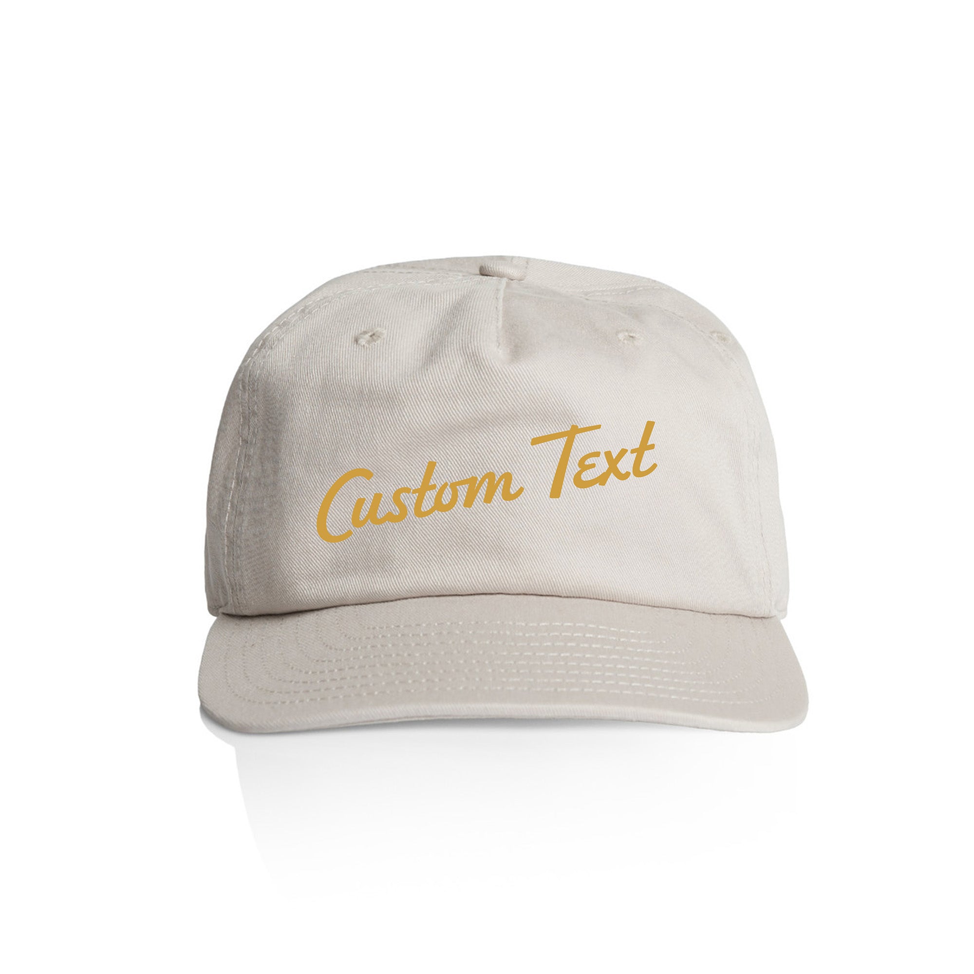 Customizable off white cap with 'Custom Text' in yellow on a white background